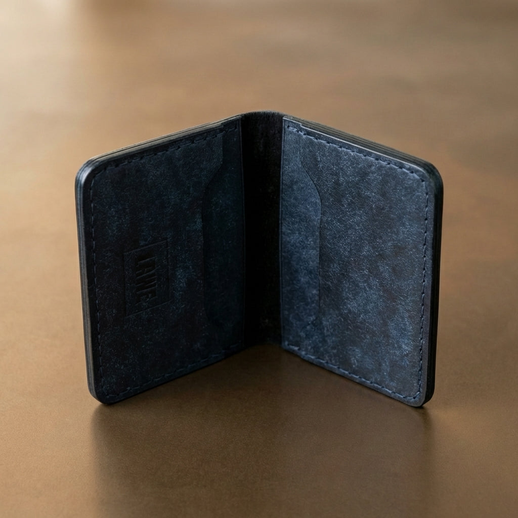 LÅWE Slate Edge Card Holder displayed at an angle on bronze background