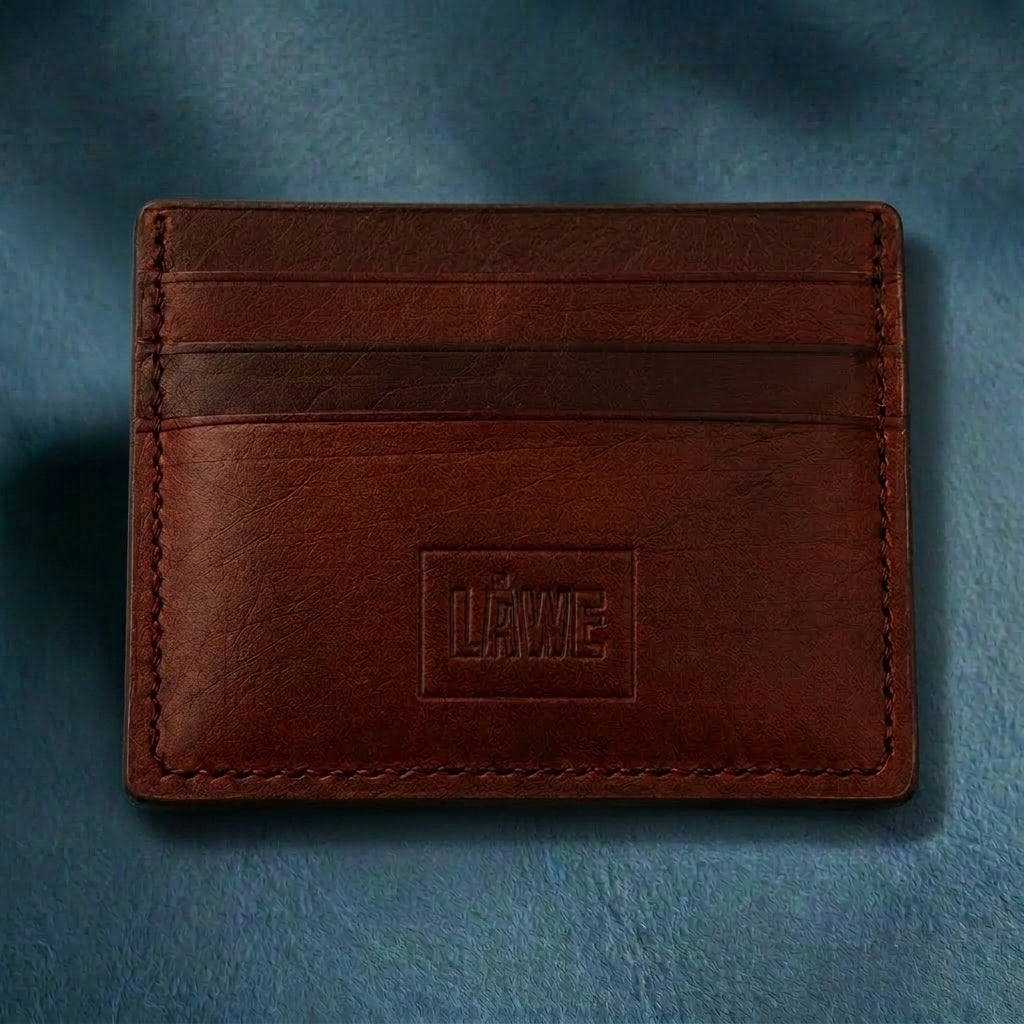 Brown leather cardholder with a brand logo on a blue textured background